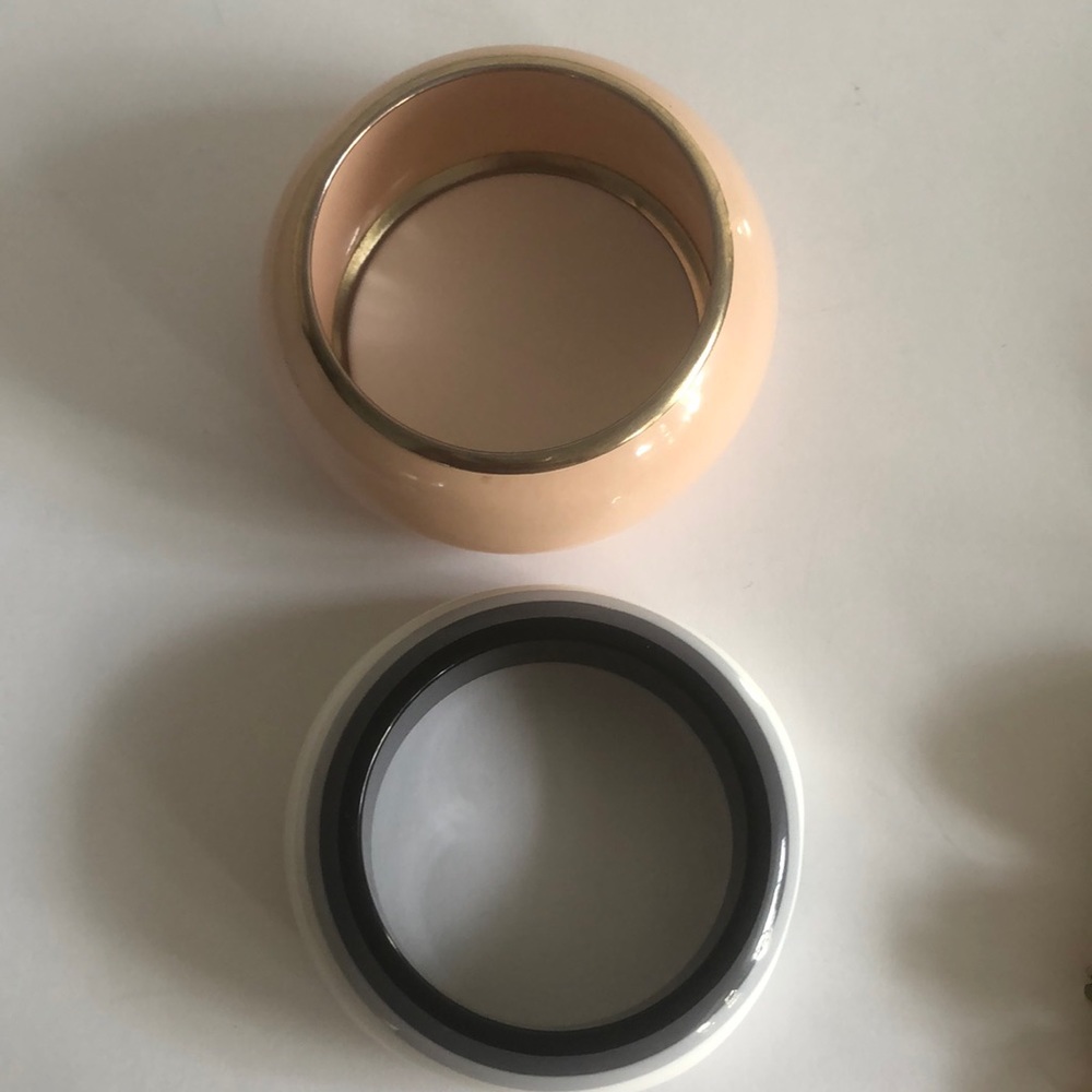 Two vintage bangles.  One is Bakelite (I believe) and one is enamel.